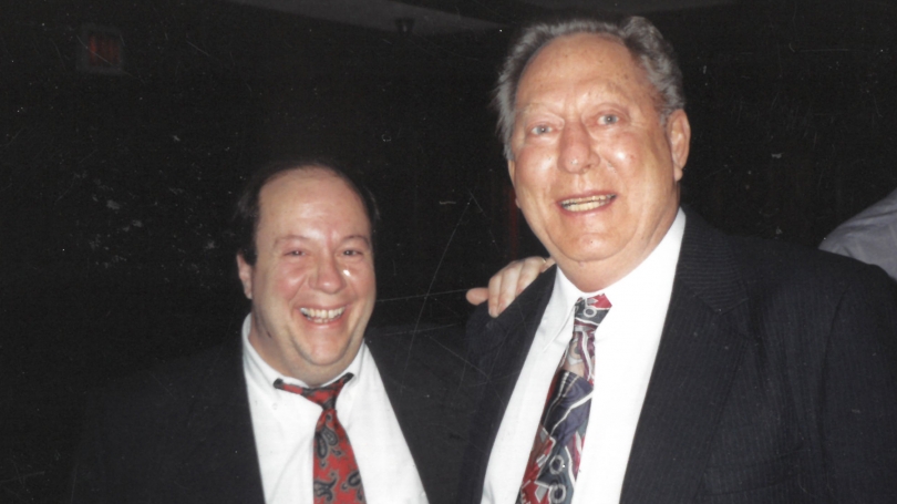 Former Director of Debate Ken Strange with coach Herb James.