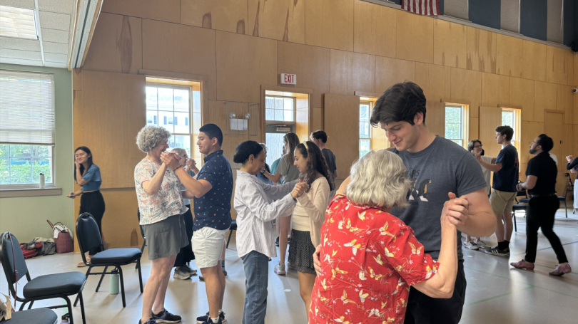 A group of people tango dancing
