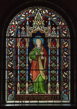 A stained glass window in Rollins Chapel, depicting the Apostle John.