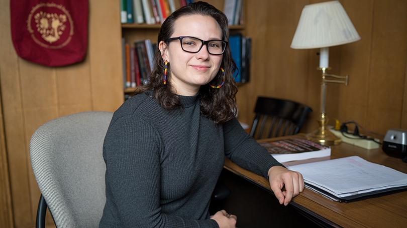 Corinne Kasper sitting at a desk