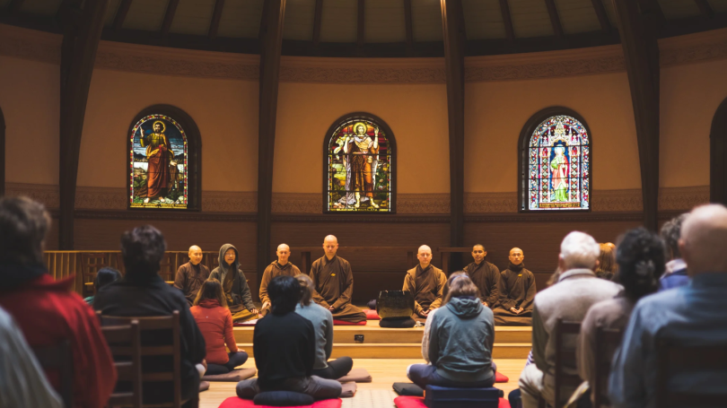 Plum VIllage monastics leading meditation in Rollins Chapel