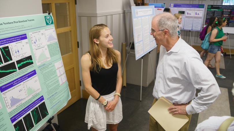 President Phil Hanlon at poster session. 